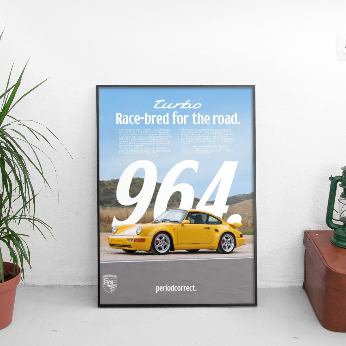 Framed poster of a yellow Porsche 964.